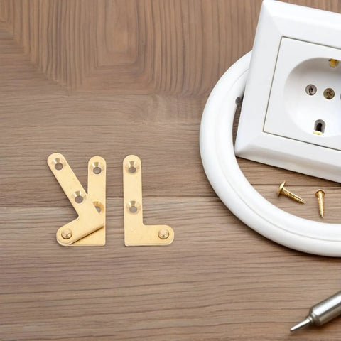 Concealed Pivot Door Hinges 4 Pack Heavy Duty Brass Hidden Shaft Hardware with screws on wooden surface and socket nearby