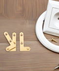 Four Pack Brass Concealed Shaft Hinges For Doors Down Pivot Heavy Duty Door Hardware on wooden surface with screws