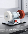Professional Grade Rock Solid Electric Bench Grinder With Non Slip Dual Wheels Vibration Proof Base, compact design with white and red wheels.