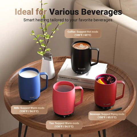 No App Hassle Self Heating Coffee Mug With Precise Temperature Control, 14 Oz Travel Cup with warm beverages on a table.