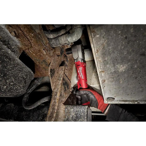 M12 Fuel Half Inch Right Angle Impact Wrench Kit used in tight space under vehicle, showing compact design and Powerstate motor