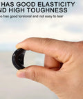 Close-up of hand bending a rubber grease cap for trailer axles, showing elasticity and toughness.