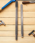 Replacement Floor Jack Handle for Hydraulic and Bottle Jacks, heavy duty steel and plastic lever, on a wooden surface.