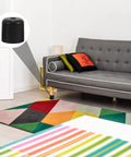 Dope Black Screw-In Furniture Legs 4 Pack for Sofas, Chairs and Dressers installed on modern sofa in colorful room, 2 inch height