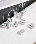 25 Piece Aluminum Spacer Set 1/2 Inch Outer Diameter 1/4 Inch Inner Diameter 1/2 Inch Length Standoff Bushings displayed on a surface