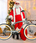 Fat Tire Cruiser Bike With 7 Speed Shimano, Iconic Stretch Chopper Frame, beach style with Santa in holiday setting
