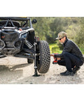 Man using Electric High Lift Off Road Jack With 2000 LB Lift Capacity, 14 Inch Lift, 17 Inch Height Adjustment, External Collar