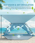 CumbreX Beach Tent Sun Shelter With Built In Canopy Pop Up 4 To 5 Person Beach Cabana in sky blue on sandy beach