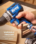 Compact Cordless 20V Drill And 1/4 Inch Impact Driver Combo Kit With Two Reliable Batteries, showing variable trigger control.