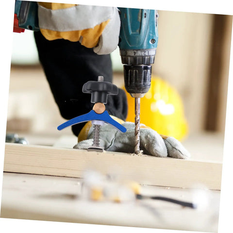 Worker using T Slot Clamp Quick Act Hold Down Clamp For Woodworking And Carpentry On T Track Systems Heavy Duty Aluminum Alloy CNC Machined Board Fixing Tool For Precise Clamping And Easy Workholding on wooden board.