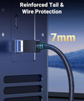 Cat 8 Ethernet cable, 6ft, braided black with RJ45 plug inserted into device.
