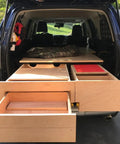 Open SUV trunk with installed Beefy 250Lb Heavy Duty Drawer Slides With Full Extension Side Mount Ball Bearing Rails And Lock.
