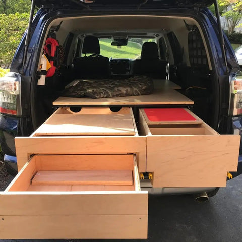 Open SUV trunk with installed Beefy 250Lb Heavy Duty Drawer Slides With Full Extension Side Mount Ball Bearing Rails And Lock.