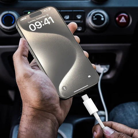 CarPlay Ready USB A To USB C Cable For iPhone 17 16 15 Series Plus Pro Max And iPad Air 10th Gen White Three Foot Car Charger Cord Delivers Instant CarPlay Activation And Smooth In Car Use in use shown connected to iPhone in car.