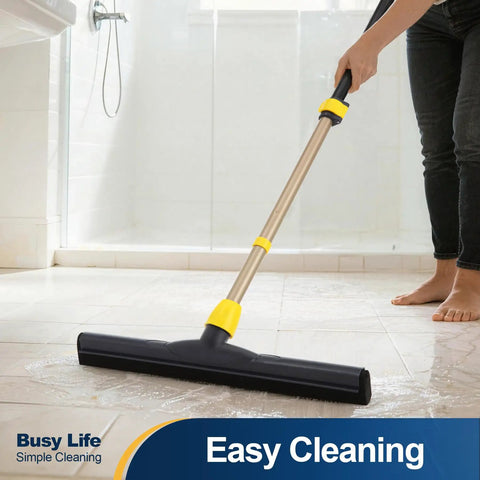 Big Time Heavy Duty Floor Squeegee Scrubber With Adjustable Telescopic Pole And Ergonomic Grip For Quick Water Removal And No Sweat Kitchen Floor Mopping used on wet tile floor.