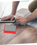 Man using Handheld Diamond Sanding Pads For Ceramic Tiles And Marble Polishing Rock Stone Edge Trimming Block Kit on floor