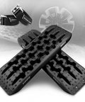 Heavy Duty Recovery Tracks for 4x4 Off Road Adventures Traction Boards Tire Ladder Mat for Sand Snow Mud Black U Design Stabilizes Enhances Grip and Helps You Get Unstuck Fast One Year Replacement Included, black nylon traction boards with tire in background