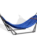 Side view of Heavy Duty Outdoor Hammock With Collapsible Steel Stand And Carrying Case, On The Go And Adjustable, Holds Up To 450 Lb Capacity, Navy Foldable Hammock Set For Camping Beach Patio, shown set up with blue fabric and black frame.
