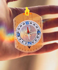Orienteering Compass For Hiking And Survival High Precision Outdoor Navigation Tool With Safety Lanyard, held in hand