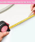 Person using tape measure from Pink Tool Set For Women With 50-Piece All-In-One Hand Tool Kit With Storage Toolbox Claw Hammer And CR-V Steel