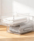 Xlarge Stackable Storage Bins 2 Pack Clear Crystal PET Baskets for Max Vertical Closet Space showcasing neatly folded towels.