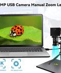 Top Tier 48MP USB Webcam Pumping Out Straight Fire 8K Ultra HD Video With 5 To 50MM 10X Manual Zoom Lens capturing a ladybug on a leaf.