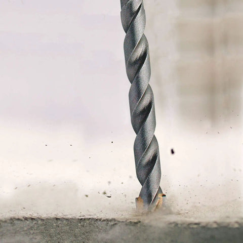 Close-up of Carbide Tipped Percussion Masonry Hammer Drill Bit 5/16 x 6 in for corded and cordless drills with dust removal flutes.