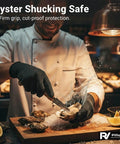 Chef using Pro Grade Cut Resistant Gloves Level 5 Food Safe With Stainless Steel Wire for oyster shucking