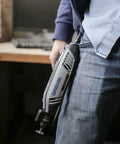 Person holding Dremel-style tool with Keyless Drill Chuck Collet Set For Rotary Tools 1/32 to 1/8 inch shank quick change adapter.