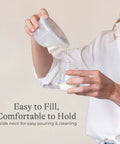 Soft Anti Colic Nipples For Everyday Bottle Feedings Paired With 5 Oz Breastmilk Storage Bottles In A Four Pack, easy pouring.