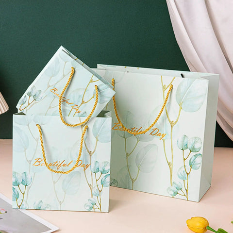 Blue Paper Bags Set 30 Pack Premium 3D Cut Tote Bags For Shopping Clothing Jewelry And Souvenirs Gift Wrapping Supplies 10 Each Size Small Medium Large Ideal For Gift Wrapping And Party Favors And Retail Packaging featuring floral design with yellow handles