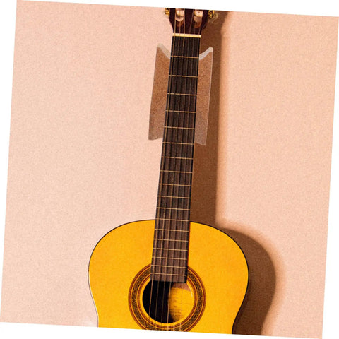 Ultimate Guitar Neck Rest Repair Kit With Premium Basswood Work Mat For Electric And Bass Care Luthier Essentials Easy Portable Travel Setup on an acoustic guitar.