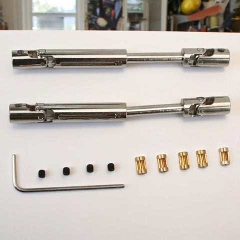 Adjustable Metal RC Drive Shaft For 1/12 Scale Crawlers, Telescoping 70mm-93mm, shows included accessories and sleeve