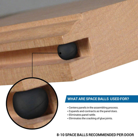 Close-up of black synthetic rubber panel spacer in wood channel. Wood Door And Panel Expansion Spacers 0.26 Inch Diameter Prevent Panel Cracking And Rattle From Humidity Changes Ensure Centered Panels With Even Spacing Of Two To Three Spacers Per Channel.