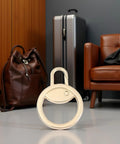 Gold Zipper Pull Replacement In A Snap Detachable Metal Zip Slider Extender Handle for luggage shown with travel bag and suitcase