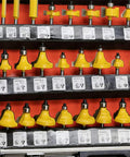 Heavy Duty 50 Piece Router Bit Set With 1/4 Inch Shank And Carbide Blades, organized in metal case, showcasing various bit designs.