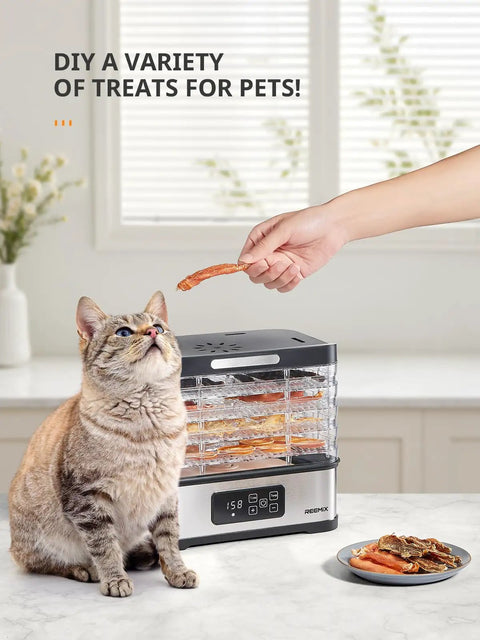 Totally Nifty Compact 5 Tier Food Dehydrator With Bpa Free Trays, drying pet treats with a cat observing in a kitchen.
