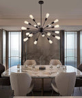 Black 18 Light Starburst Chandelier Pendant Light 36 Inch Wide For Living Room Dining Room Kitchen Island Foyer Retro Style Modern Farmhouse Industrial Ceiling Fixture With Adjustable Height And Durable Spray Painted Metal in modern dining setting.