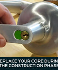 Grab This Heavy Duty Seven Pin Green Small Format Interchangeable Core showing installation on a door handle for job site security.