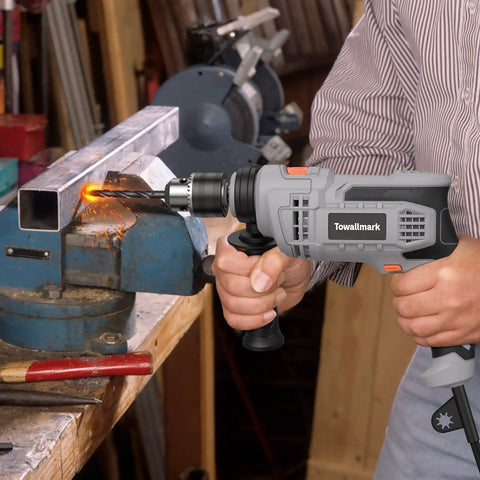 Person using Beefy 7 Amp Hammer Drill Corded 1/2 Inch Chuck 3000 RPM Variable Speed With 10 Drill Bits For Wood Masonry Steel DIY Home Improvement