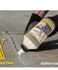 Applying 2X Concrete Crack Sealant Easy To Use No Mess Ready Mixed Filler For Cracks Up To Half Inch on a patio surface