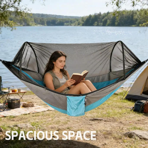 Woman relaxing in Camping Hammock With Integrated Mosquito Net For Double Or Single Use Easy Setup Portable Hammock Set by a lake