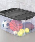 Heavy Duty 76 Quart Plastic Storage Bins With Snug Lids For Garage Organization Knock Out Messy Clutters With These Stackable Clear Base Gray Lid Totes containing sports balls.