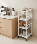 White 4 Tier Rolling Kitchen Cart With Pull Out Shelf Adjustable Middle Racks And Secure Locking Wheels Microwave Stand in modern kitchen setting.