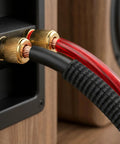 4 Gauge CCA Battery Cable Set, 26ft Red And 26ft Black With Cable Sleeves, Dual Automotive Power Ground And Car Audio Extension Cord, Copper Coated Aluminum For Beefy Conductivity In Trucks, RVs, And Marine Installs, shown on terminals