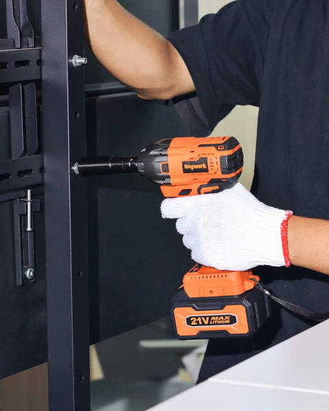 Cordless One Half Inch Impact Wrench Kit With 260 Ft Lbs Torque And 3700 RPM Beast Power 21V in use on metal frame