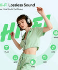Person enjoying music with headphones, promoting Hi-Fi lossless sound for Bluetooth Mp3 Player With Auto Reconnect Five Point Four One Point Eight Inch Screen 64GB Memory Built In Speaker Micro SD Ready Dope Daily Music Player For On The Go With Fast Reconnect To Your Last Paired Device.