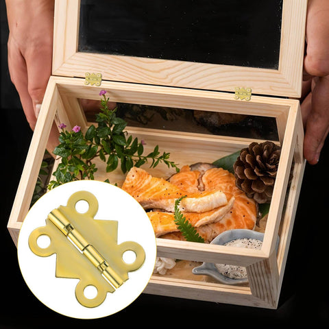 Stainless Steel Tiny Box Hinges 15 Piece Set With 60 Screws Vintage Gold Folding Cabinet Hinges on a wooden gift box display