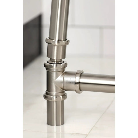 Close-up of brushed nickel finish, solid brass Tub Waste And Overflow Drain Assembly With Double Pivoting Action, Toe Touch Stopper.
