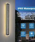 Dope Outdoor Wall Light LED 42W 3000K 35 Inch Long Black Metal Waterproof Modern Exterior Lighting Fixture displayed in rain